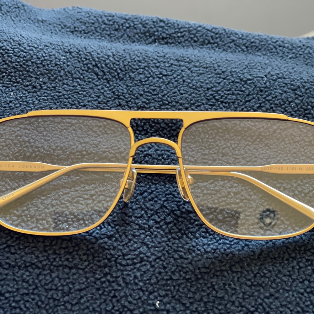 Elisa Johnson Jane in Gold medal sunglasses